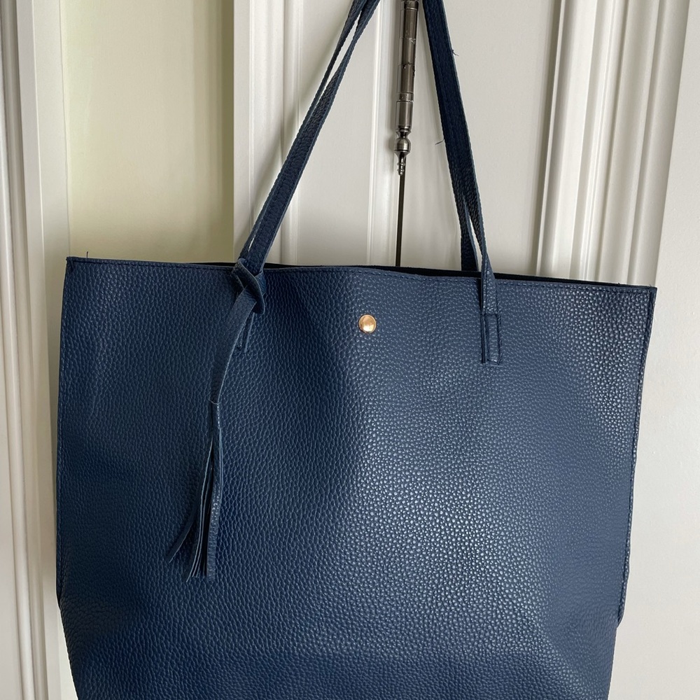 Selling blue leather bag! Never used.